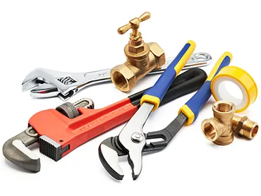 Plumbing tools on white background
