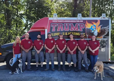 Trump Plumbing and Heating Team in front of van